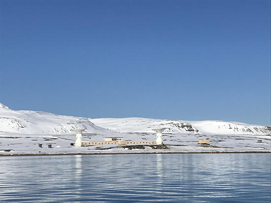 The scientific base of Ny-Ålesund, Svalbard, as seen from the sea.